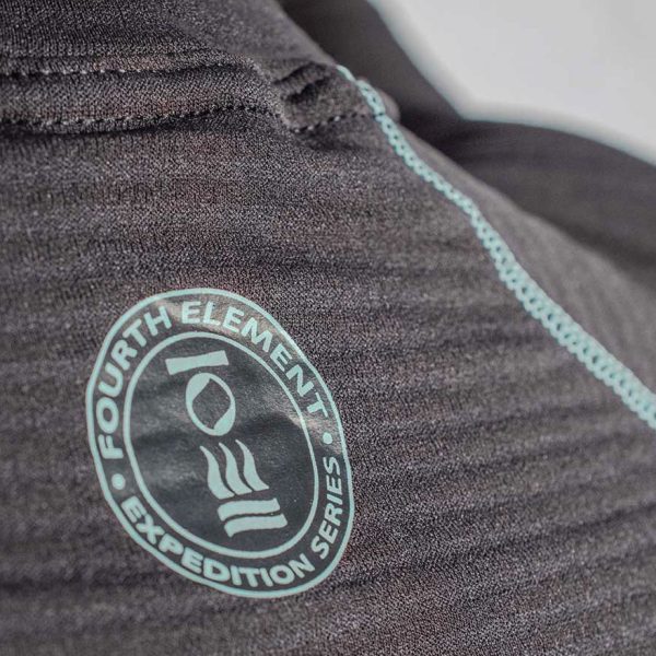 Close up of the logo on the back of the women's Fourth Element J2 Baselayer longsleeve top