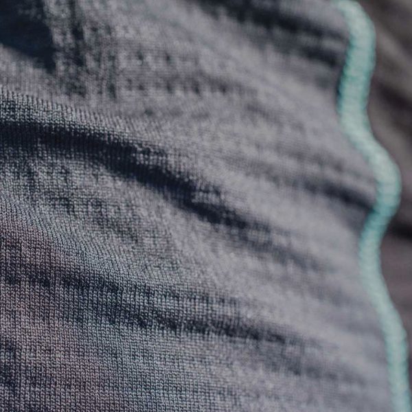 Close up of the stitching of the women's Fourth Element J2 Baselayer longsleeve top