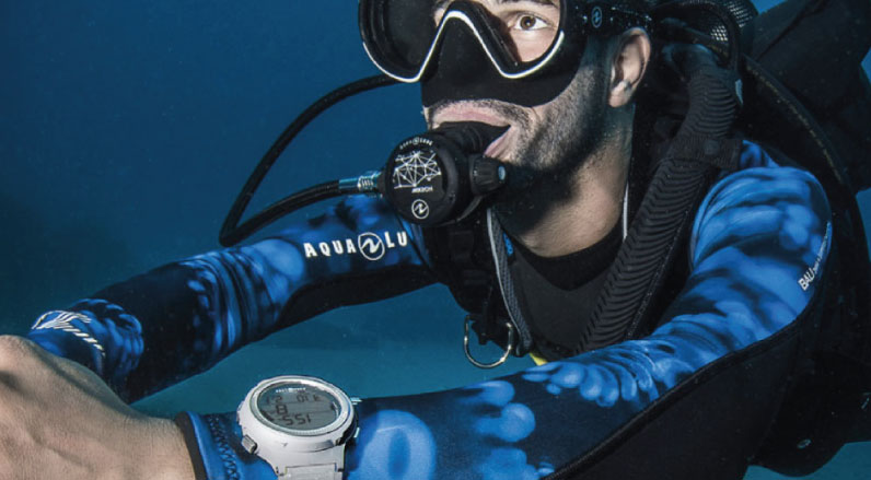 Diver wearing one of the best dive computers for beginners