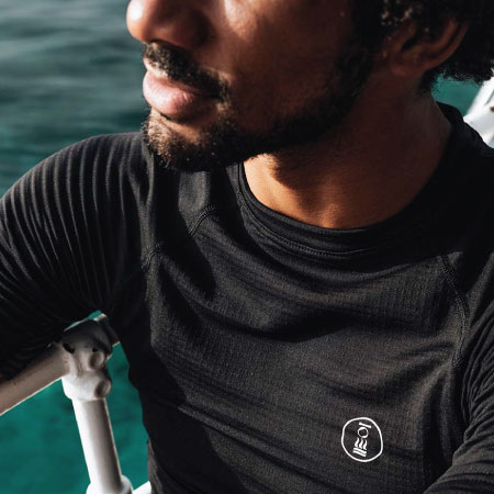 https://thehonestdiver.com/wp-content/uploads/2024/08/Fourth-Element-J2-Short-Sleeve-Top-undersuit.jpg